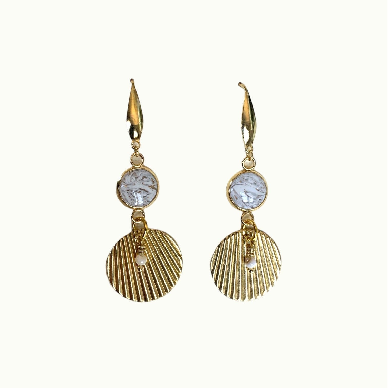 Lise Fiola Creations Deco earrings featuring gold-plated brass, marbled polymer clay, and textured circular pendants.