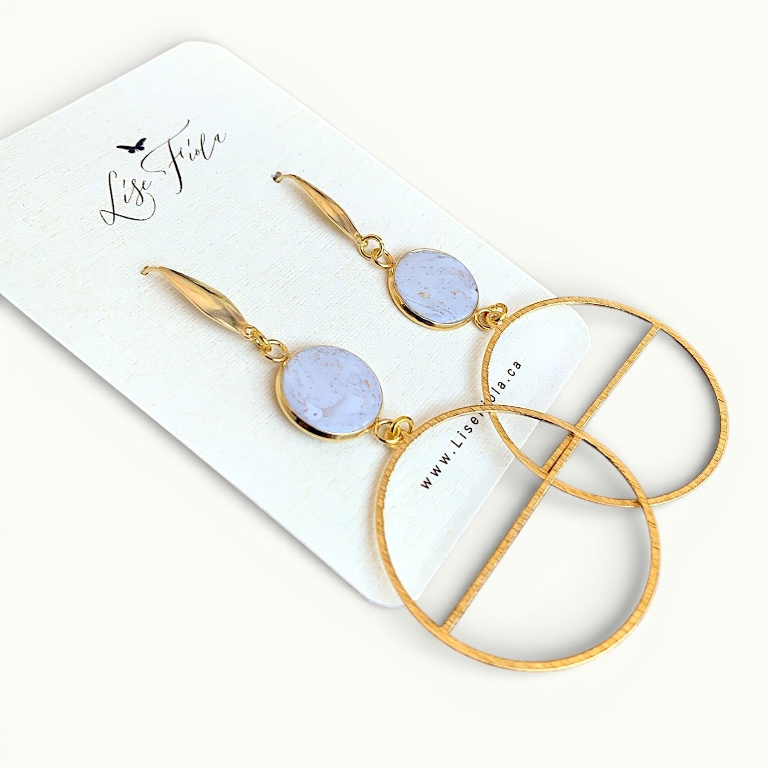 Lise Fiola Creations Delicate Luna earrings featuring gold-plated brass, stainless steel, and marbled polymer clay.