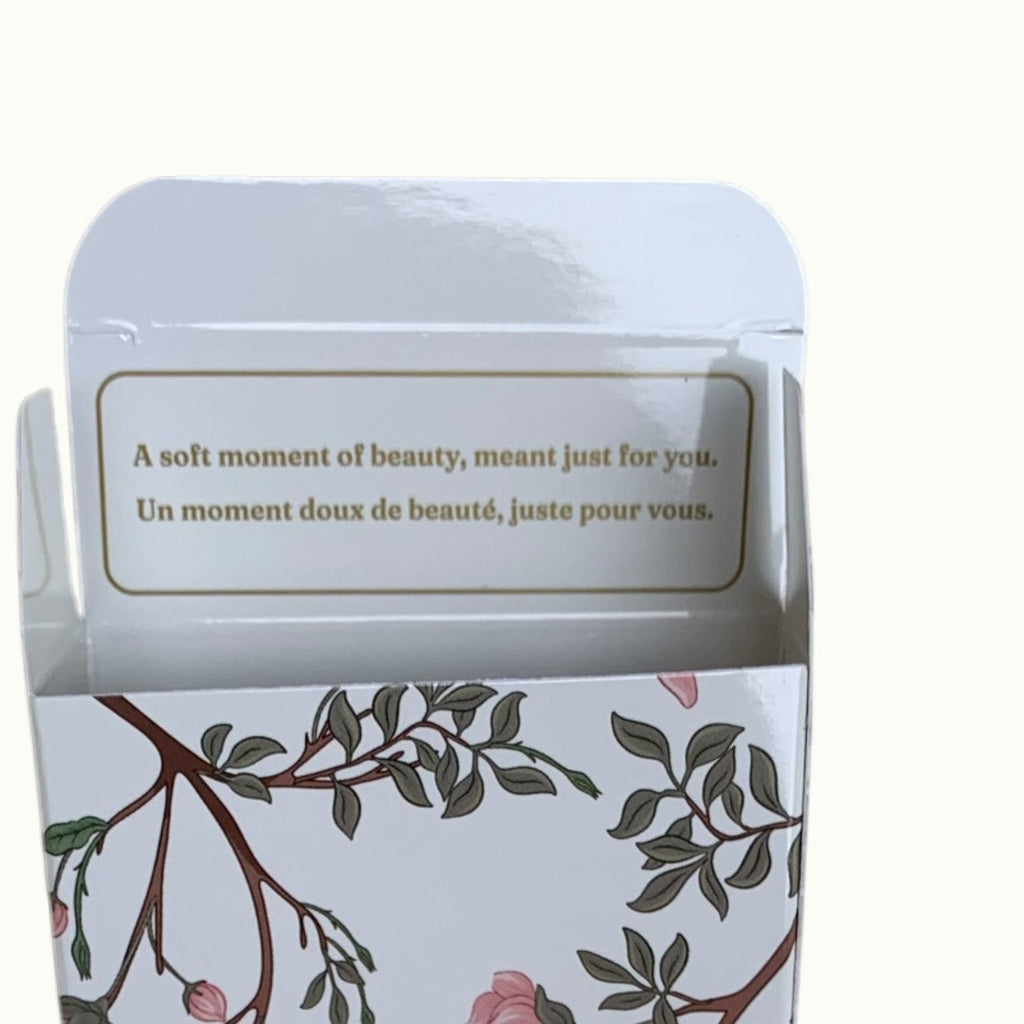 Lise Fiola Creations artisanal soap box featuring floral botanical illustrations and an inspirational message inside.