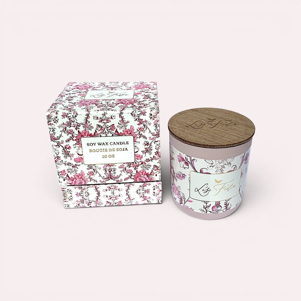 Lise Fiola Creations 10 oz soy wax candle with floral pattern and wooden lid, displayed with its matching gift box.