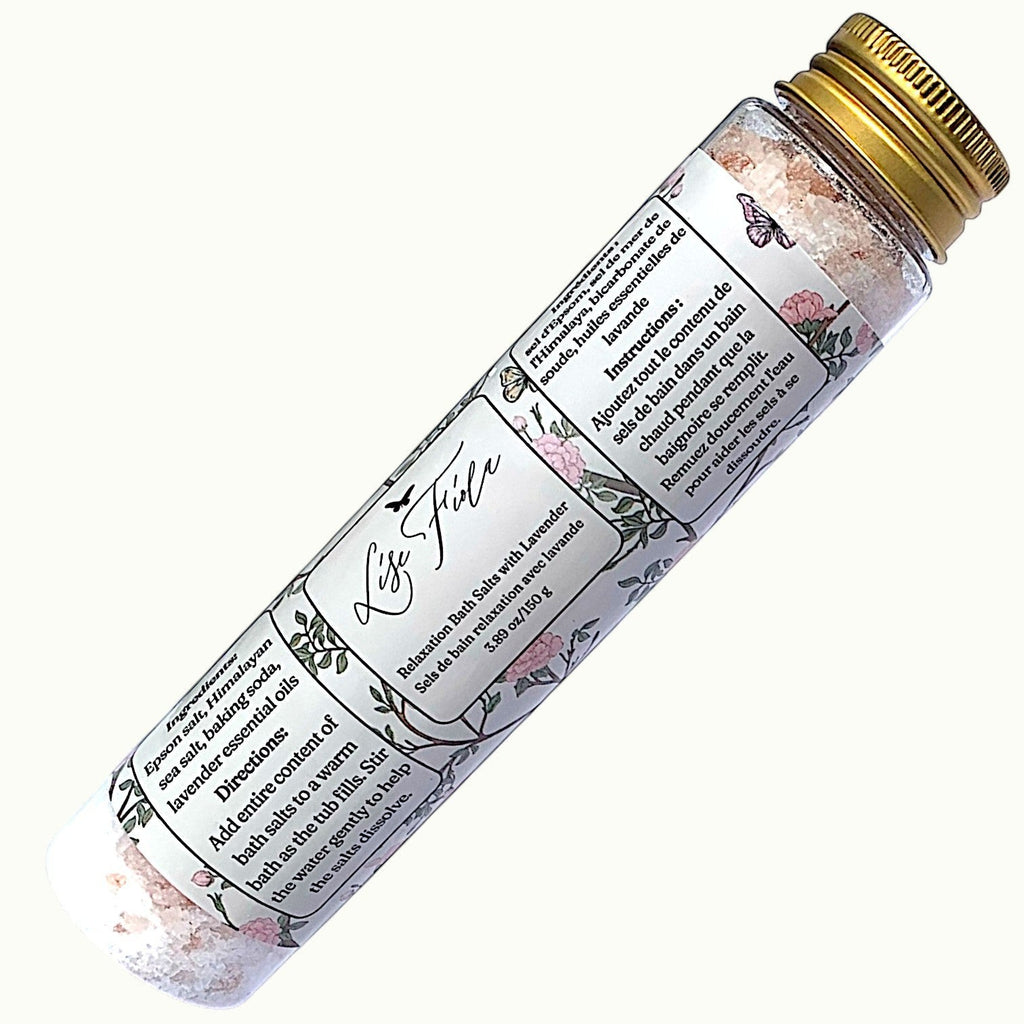 Lise Fiola Creations Relaxation Bath Salts in a glass tube with pink floral label and gold cap