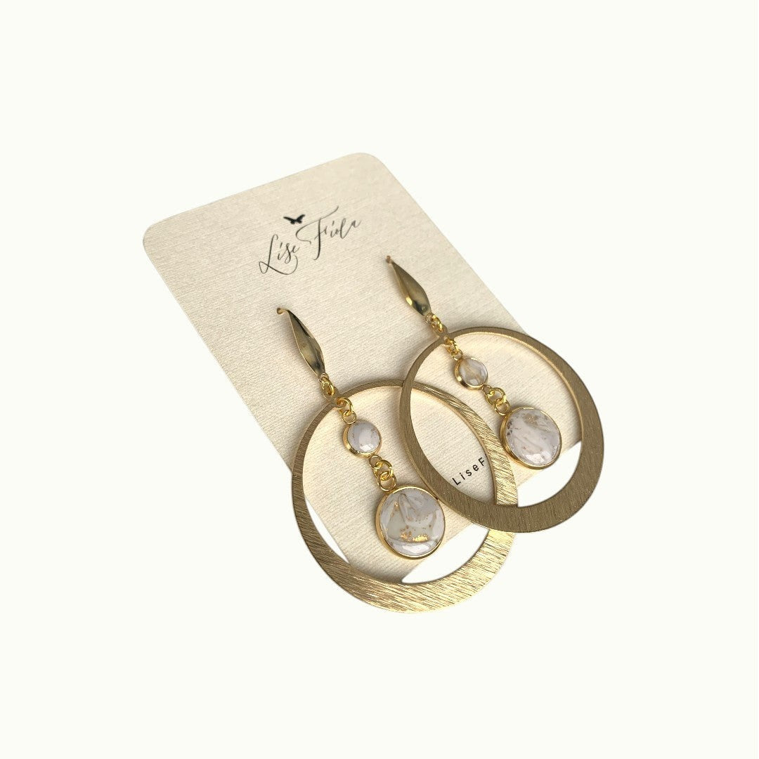 Lise Fiola Creations Luna earrings featuring gold-plated brass hoops and marbled polymer clay in neutral tones.