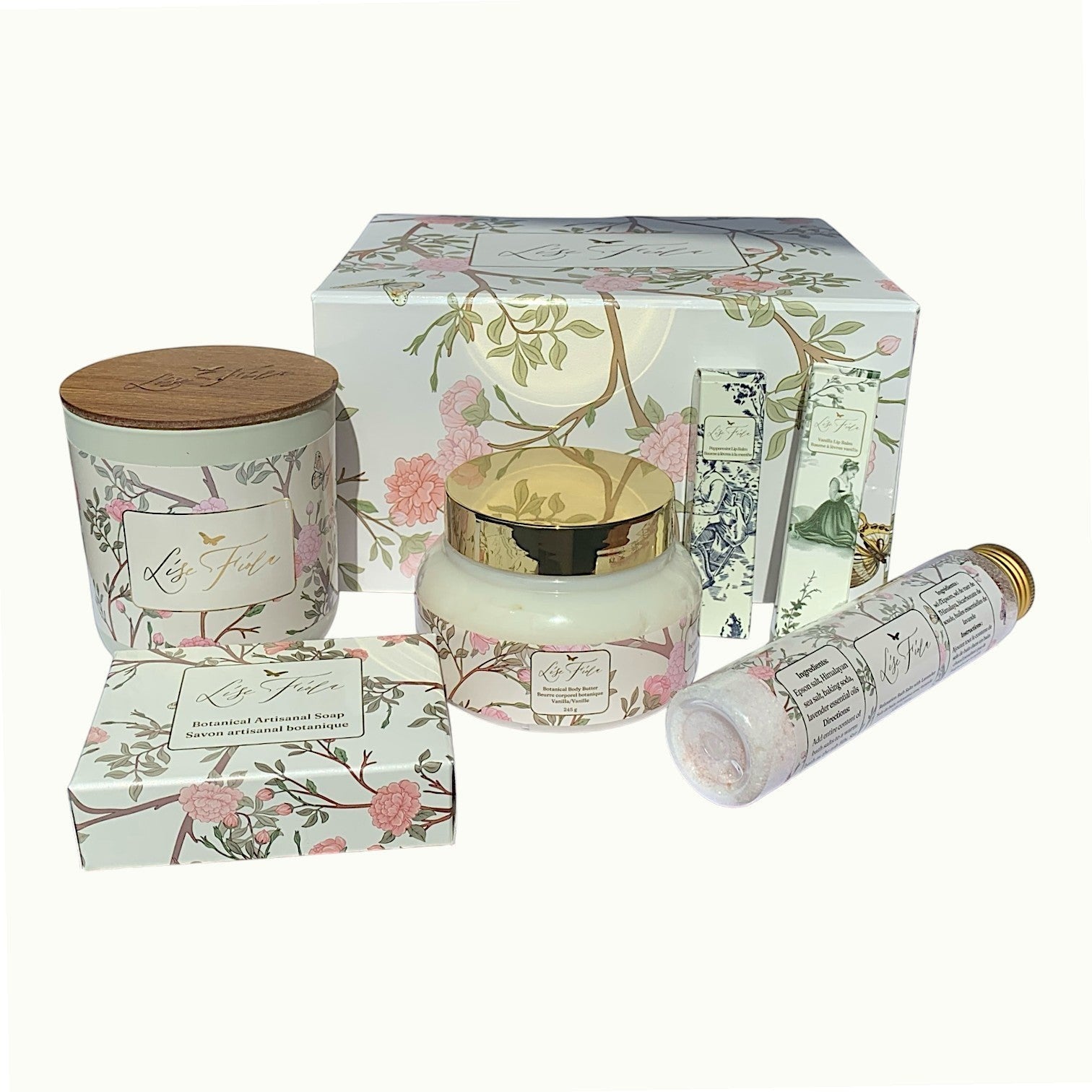 Lise Fiola Creations luxury self-care gift set with vanilla body butter, botanical soap, candle, and bath salts.