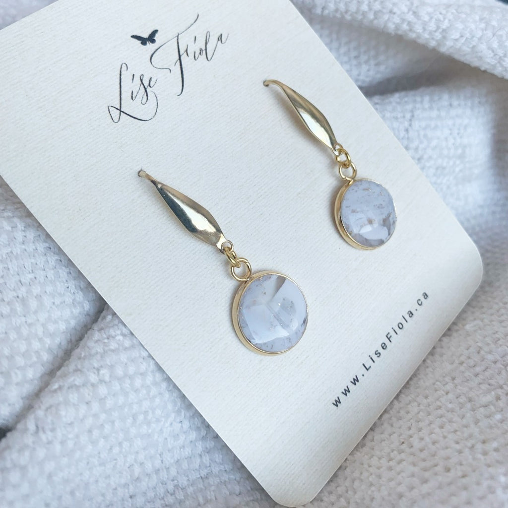 Lise Fiola Creations Forever earrings featuring marbled grey, white, and gold polymer clay in 18k gold-plated brass.