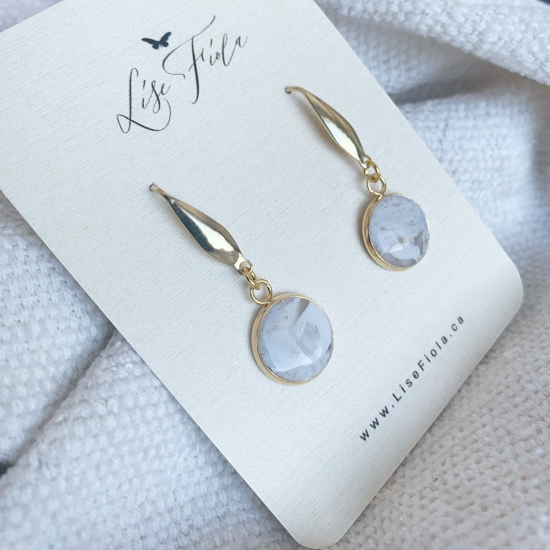 Lise Fiola Creations Forever earrings featuring marbled grey, white, and gold polymer clay in 18k gold-plated brass.