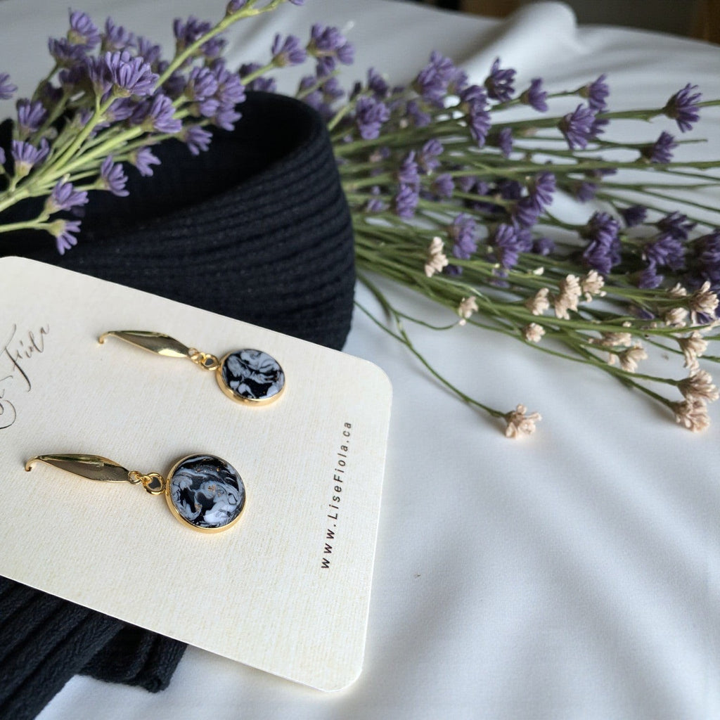 Lise Fiola Creations handmade polymer clay earrings with black, white, and gold marbled design and gold-plated brass.
