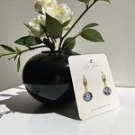 Lise Fiola Creations handmade polymer clay earrings with black, grey, and white marble patterns and gold accents.
