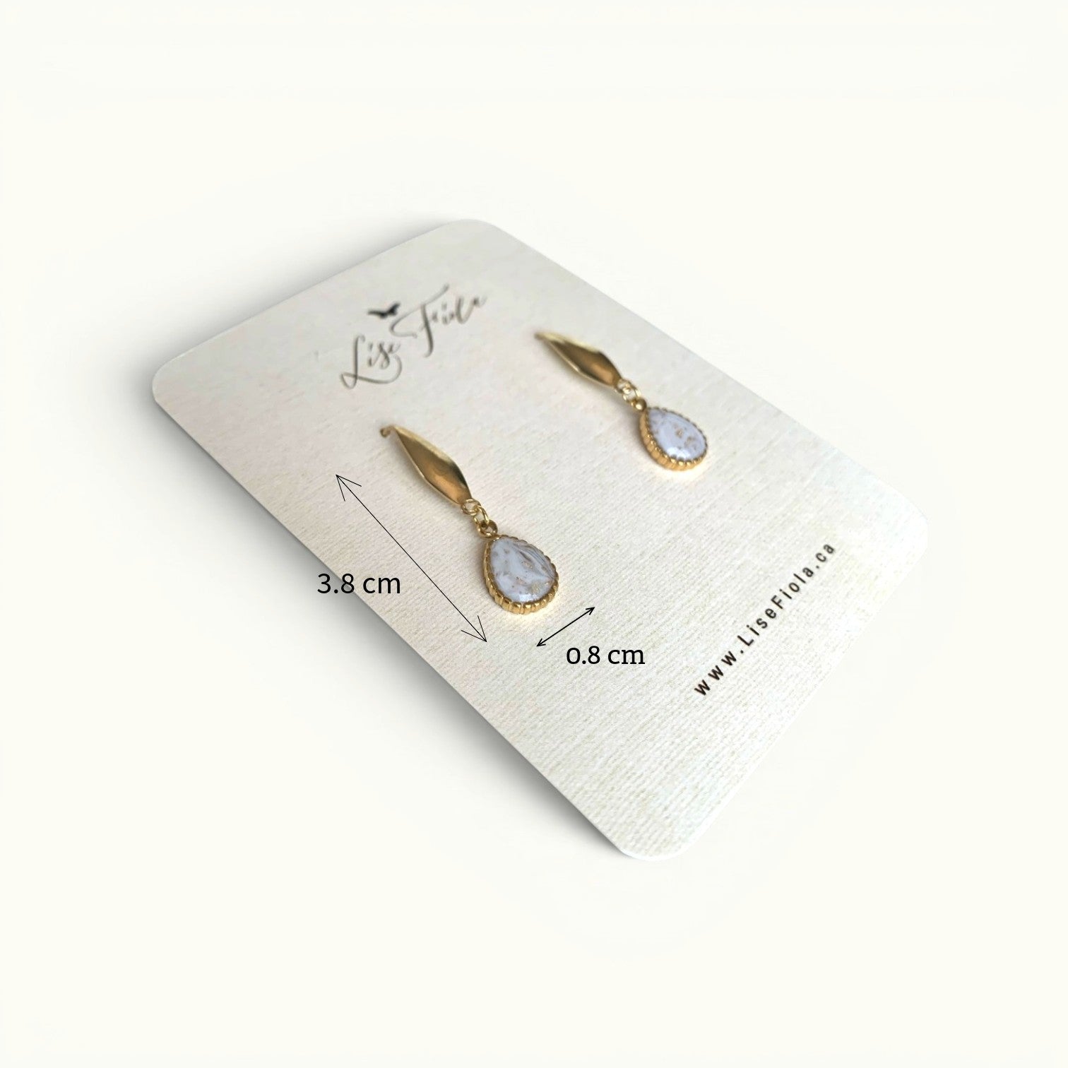 Lise Fiola Creations Dot Drop earrings featuring marbled polymer clay in beige and white with 14k gold-plated accents.