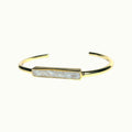Lise Fiola Creations adjustable bangle bracelet with a marbled polymer clay bar and 18k gold plated brass band.