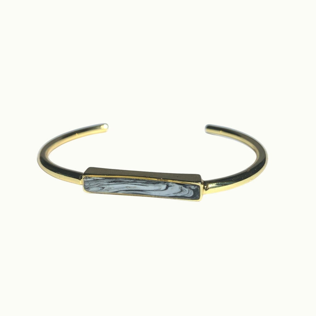 Lise Fiola Creations handcrafted gold plated bangle bracelet with a black and white marbled polymer clay bar.
