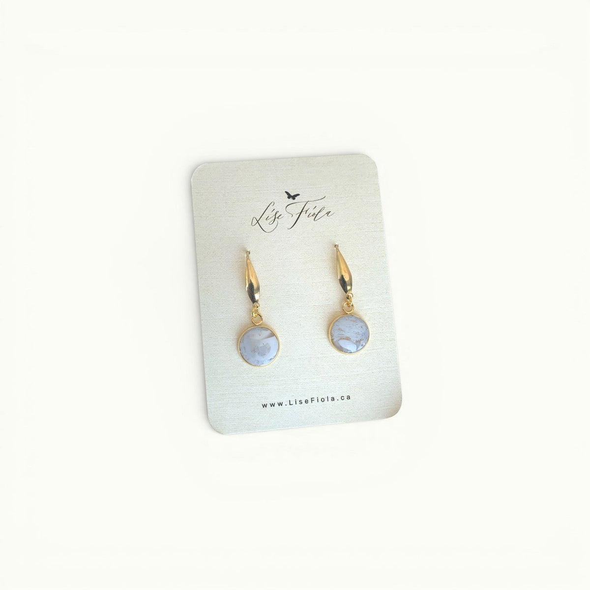 Lise Fiola Creations Forever light earrings featuring marbled grey and white polymer clay with 18k gold-plated brass.