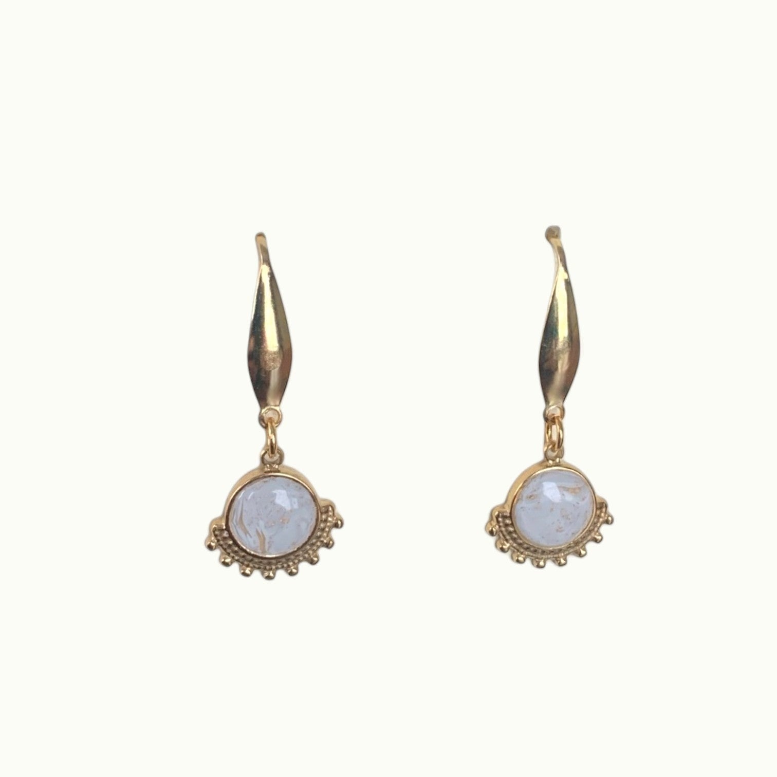 Lise Fiola Creations Wink earrings featuring marbled beige and white polymer clay with 14k gold-plated accents.