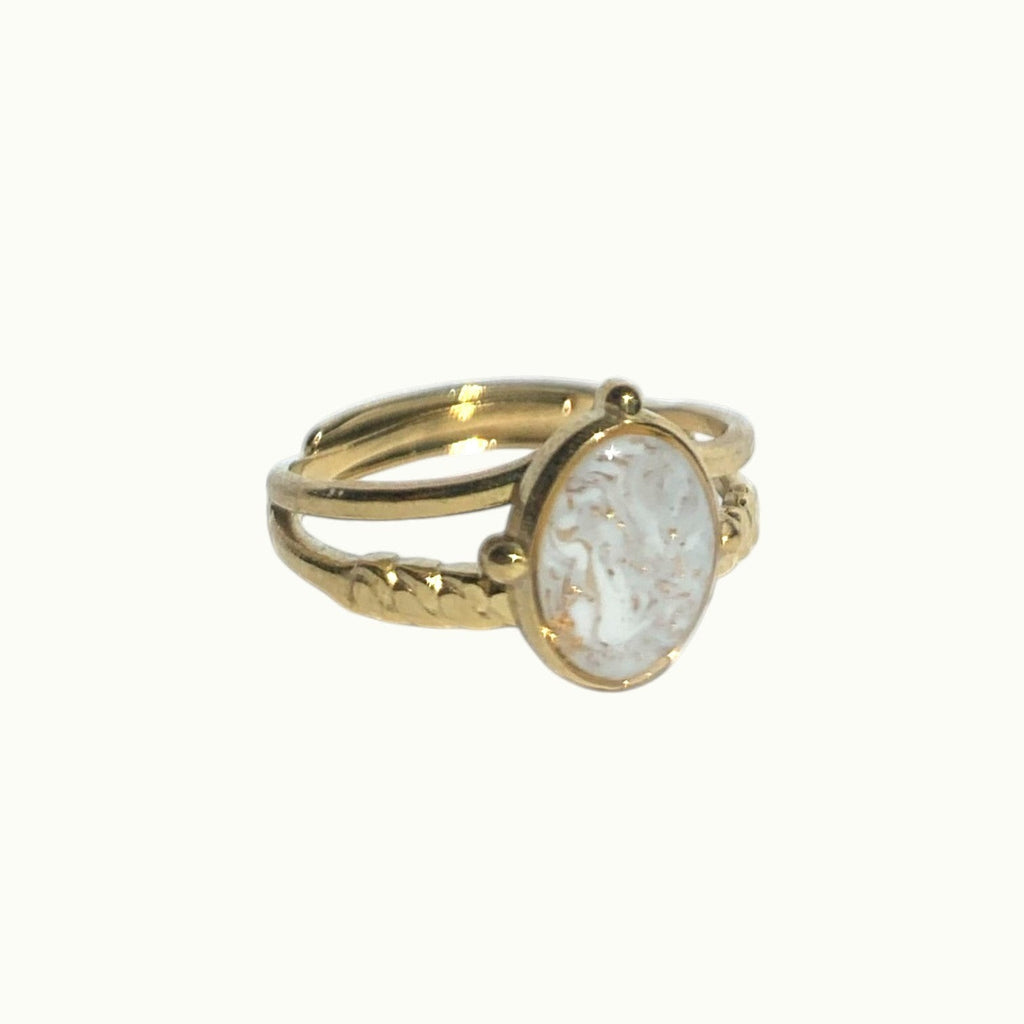 Lise Fiola Creations handmade adjustable ring with a marbled beige and gold polymer clay oval on a gold plated band.