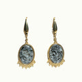 Lise Fiola Creations oval drop earrings featuring marbled black, white, and grey clay with 18k gold-plated accents.