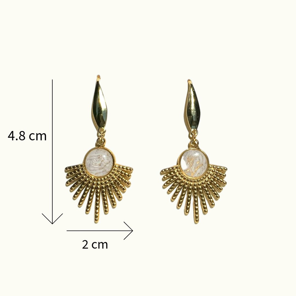 Lise Fiola Creations Sun Ray earrings featuring marbled polymer clay, 14k gold-plated stainless steel, and sunburst design