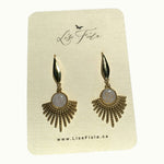Lise Fiola Creations Sun Ray earrings featuring marbled polymer clay and 14k gold-plated stainless steel sunbursts.