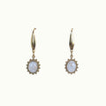 Lise Fiola Creations Sunshine Oval earrings featuring marbled beige and white clay in gold-plated scalloped settings.