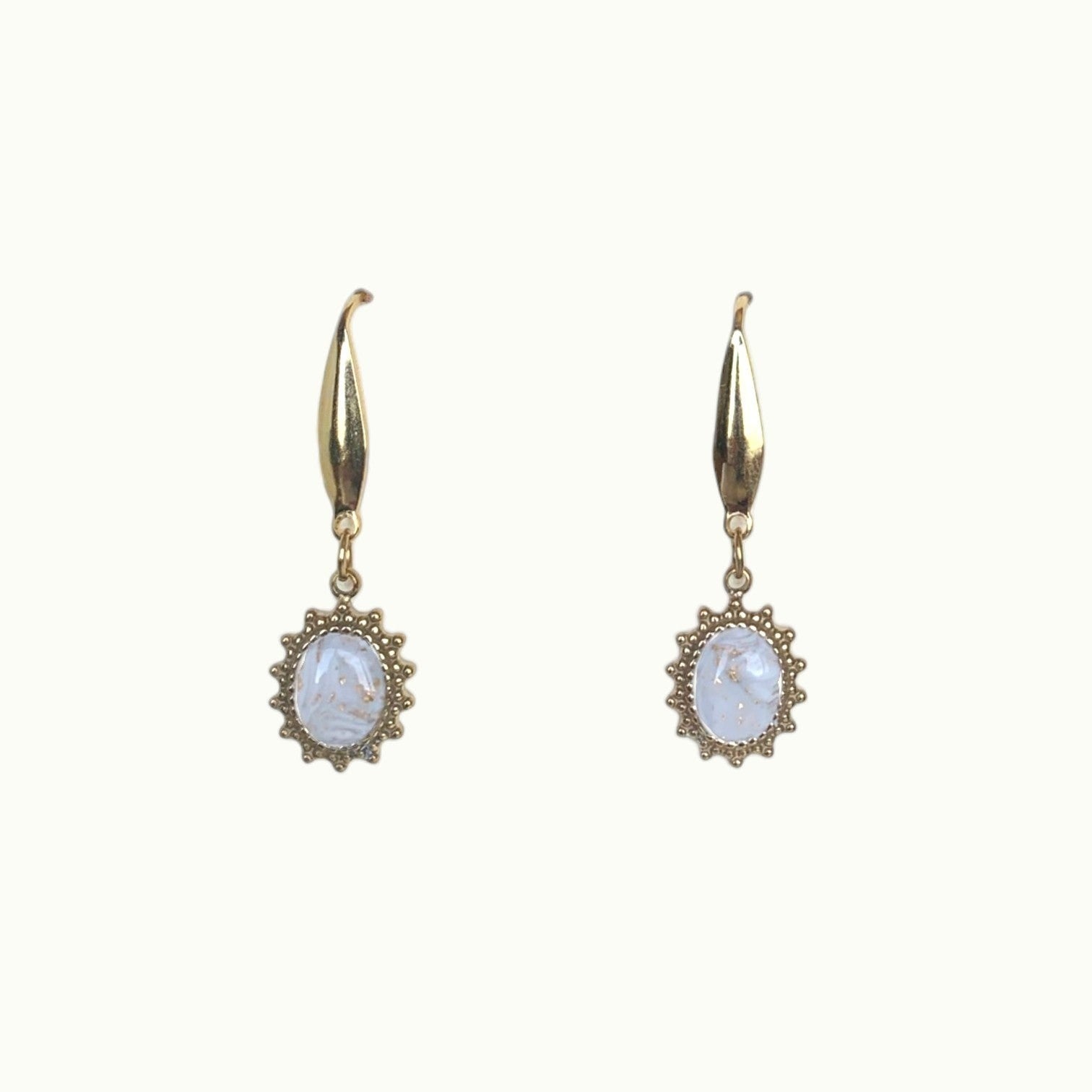 Lise Fiola Creations Sunshine Oval earrings featuring marbled beige and white clay in gold-plated scalloped settings.
