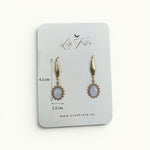 Lise Fiola Creations Sunshine Oval earrings featuring marbled beige and gold accents on 14k gold-plated stainless steel.
