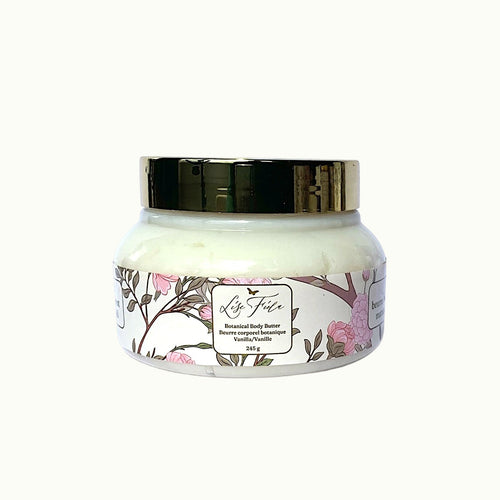 Lise Fiola Creations vanilla body butter in a 275g jar with a floral botanical label and gold lid.