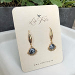 Lise Fiola Creations Wink earrings featuring marbled grey, black, and white clay with 14k gold-plated accents.